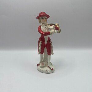 Vintage Porcelain Bisque Victorian in Red Playing French Horn